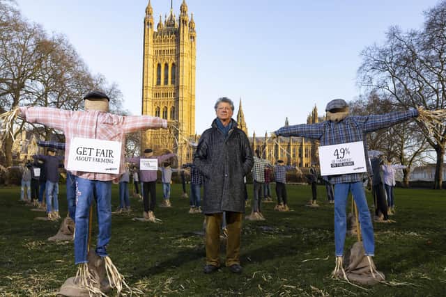 Guy Singh-Watson, Riverford founder, in front of 49 scarecrows outside the Houses of Parliament as part of their campaign ‘Get Fair About Farming’ calling for the Government to force the leading supermarkets to adopt fairer principles for British farmers. (Picture: David Parry/PA Wire)