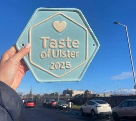 Taste of Ulster plaque signposting quality food and a commitment to local sourcing.
