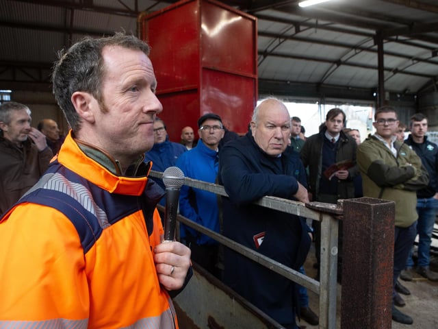 Matthew Workman addresses visitors to his farm
