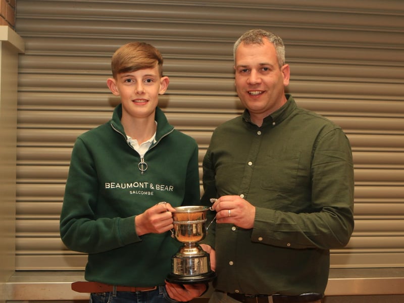 Rhys Rodgers collecting the Carnkern Cup, winner of this year’s under 16 stock judging competition, presented by chairman Shane McDonald.