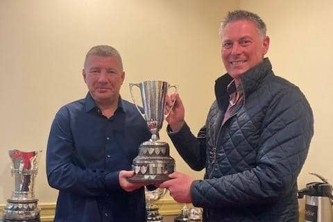 Tim Hunniford (Sprayrite Agri) presenting Raymond Glass with the Syngenta Cup for the orchard with the highest state of crop husbandry, especially freedom from pests and diseases. (Pic: UFU)