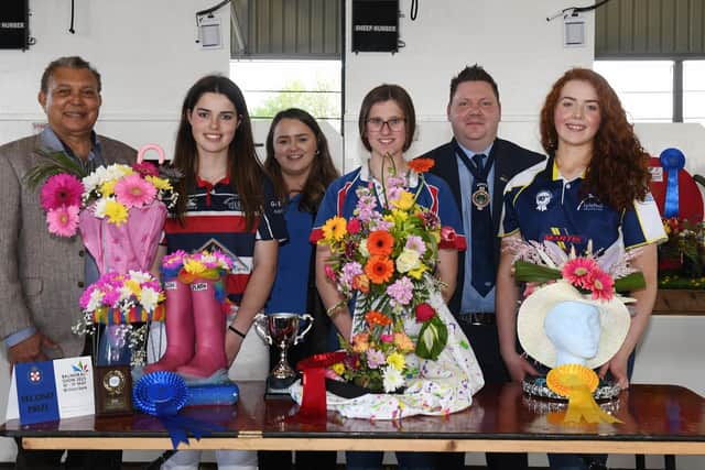 Members who won the 14-16 section in the floral art competition with judge, Gregory Baptie (left), Kerri Ann Curran, Power NI (centre), YFCU president, Stuart Mills (left)