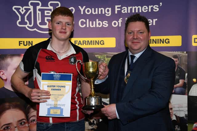 Under 21 Ulster Young Farmer competition winner Jamie Bell with YFCU president, Stuart Mills