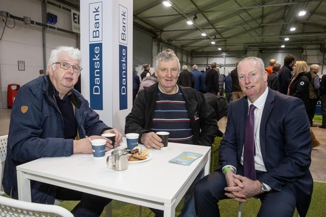 Seamus McCormick from Danske Bank chats with David McFetridge and Trevor Brown at the Danske Bank stand during RUAS Winter Fair. (Pic: MCAULEY_MULTIMEDIA)