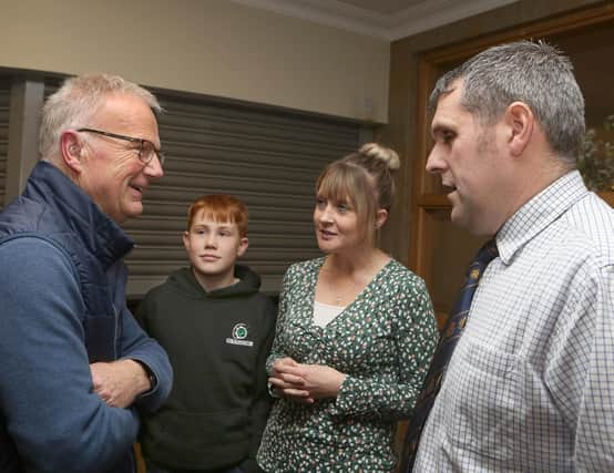 Steven Sandison (right) a suckler and sheep farmer from Orkney, and guest speaker at Fermanagh Grassland Club, with his wife Lorraine and son Glen, chatting with club treasurer, Philip Clarke. Pic: Raymond Humphries