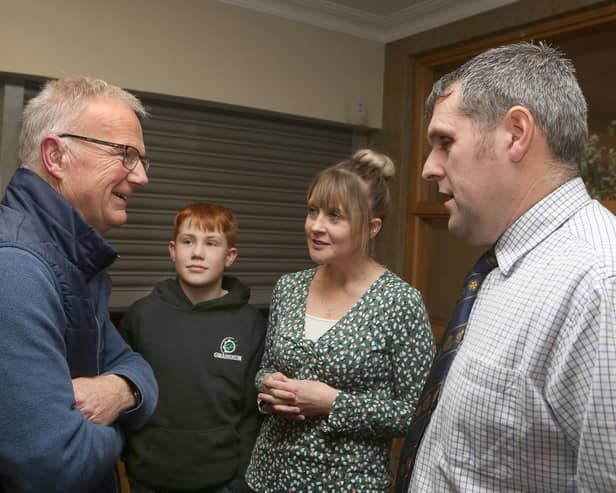 Steven Sandison (right) a suckler and sheep farmer from Orkney, and guest speaker at Fermanagh Grassland Club, with his wife Lorraine and son Glen, chatting with club treasurer, Philip Clarke. Pic: Raymond Humphries