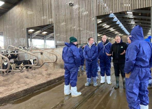 Farmer John Banks with the visiting N.I. dairy farmers