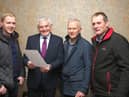 Seamus McCaffrey (second from left) an accountant from Omagh and guest speaker at Fermanagh Grassland Club, discussing tax planning with club members (from left) Gareth Beacom, Kesh; Philip Clarke, Augher and Ian Brown, Macken.
