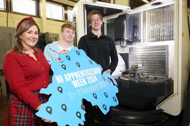 Pictured in the School of Mechanical and Aerospace Engineering at Queen’s University Belfast are (left to right) Moira Doherty, head of skills and education at DfE; and level 3 manufacturing and engineering apprentices Reece Magill and Isaac Forsythe. Picture: Submitted