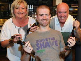 END RESULT! Matthew McAllister who got his hair and beard shaved by hairdresser Sharon Scott at Bushmills Distillery on Saturday to raise funds for MacMillan Cancer 'brave the shave' in memory of his mum Stephanie. (PICTURE KEVIN MCAULEY/MCAULEY MULTIMEDIA)
