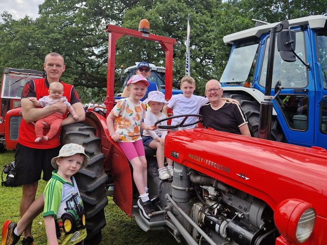 Stephen Rooney, Mayobridge, Eamon Rooney and Stephen Rooney, both Warrenpoint, with children and grandchildren at this year's Kilbroney Vintage Show which was held at Kilbroney Forest Park, Rostrevor. Picture: Darryl Armitage