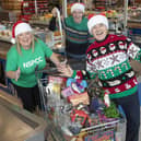 Pictured (l-r) are NSPCC Supporter Fundraising Manager Stefani Mearns, Lidl Northern Ireland Regional Managing Director Ivan Ryan and Frank Mitchell, this year’s Lidl Northern Ireland Trolley Dash Ambassador. (PHIL SMYTH PHOTO)
