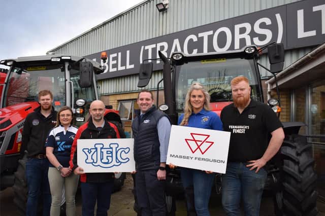 Farm machinery brand Massey Ferguson is once again supporting the YFCU as principal sponsor of their AGM and conference. Pictured: Samuel Bell from William Bell Tractors Ltd (centre left) and YFCU president, Peter Alexander (centre right) with YFCU members.