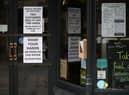 Signs in a coffee shop in Main Street Fort William as people are asked to stop travelling to the Scottish Highlands in a bid to avoid spreading the coronavirus (Photo: Jeff J Mitchell/Getty Images)