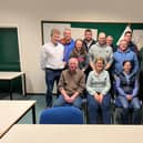 Seated is H McBratney (vice-chairman) S Malcomson (chairperson) and Margo Fenton (club secretary) with other committee members. (Pic: NI Charollais Sheep Society)