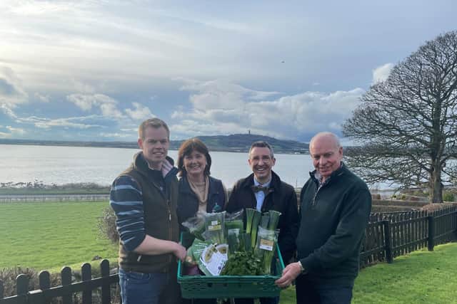 Agriculture, Environment and Rural Affairs Minister Andrew Muir is pictured with Alexander, Sheila and Roy Lyttle on a visit to their farm where they grow, prepare vegetable and supply to local businesses.Pic: DAERA