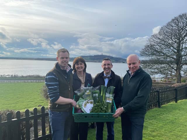 Agriculture, Environment and Rural Affairs Minister Andrew Muir is pictured with Alexander, Sheila and Roy Lyttle on a visit to their farm where they grow, prepare vegetable and supply to local businesses.Pic: DAERA