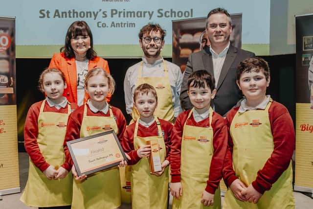 Brennan's Bread Dough It Yourself: St Anthony’s Primary School pupils Sophie McKeown, Emma Neville, Martin Maybin, Joseph Morrow and Francis McAllister. Pictured with event MC Denise Watson, Chef Brian Timon, and Ivan Hammond of Brennans Bread.