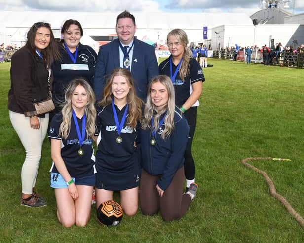 Women's five-a-aside football winners, Newtownstewart with YFCU president Stuart Mills at this year's Balmoral Show