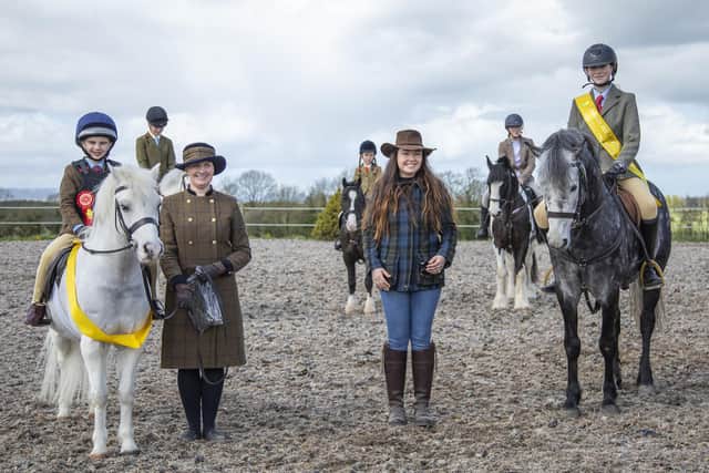 Cameron Barry and Rhydygrug Peter Pan champions with judge Eilish Smith and in reserve Charlene Doherty and Owenbuoy Blue Ruben who took part in the Causeway and Glens Riding Club working hunter on Easter Monday