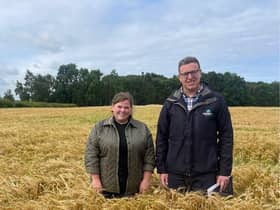 Holestone YFC's Victoria Minford with judge in her field of winter barley. Picture: Holestone YFC