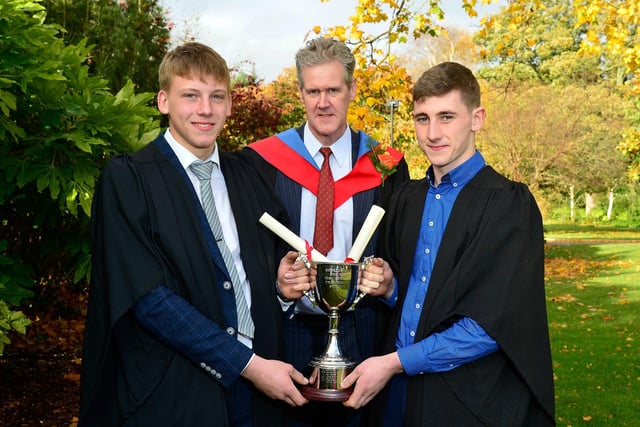 he Redrock Cup was awarded to the best overall Land-based Engineering students at the Greenmount Campus autumn graduation event. This year the joint winners were Nathan Morris (Kilkeel) and Mark Cassidy (Carrickroe, Co Monaghan). Congratulating the graduates is Billy Keating (CAFRE, Lecturer)
