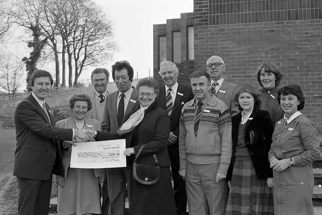 Members of the North Down Charity Horse Show Committee handed over £3,500 which they had raised for local charities a reception in December 1982 held at Dundonald. Pictured are the representatives of the different charities who received cheques from the committee. Picture: Farming Life/News Letter archives