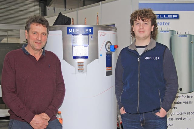 Discussing the benefits of the Mueller Fre-Heater are Broughshane dairy farmer Wilbert Hamilton, and David Wilson from Wilson Milk Tanks. Picture: Julie Hazelton