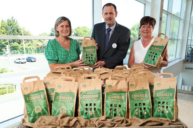 Looking forward to the availability of Comber Earlies' being available in TESCO stores across Northern Ireland next week, l to r: Joanne Weir, Wilson's Country Potatoes, Gareth Morton, TESCO Northern Ireland and Sandra Weir, TESCO Northern Ireland