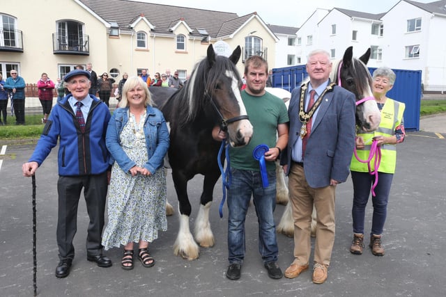 Chris Butler and Morris Brown with their prizewinners, judge Packie Harkin, Mayor Steven Callaghan and Deputy Mayor Margaret Ann McKillop at the Ould Lammas Fair Heavy Horse Show in Ballycastle on Saturday. (PICTURE KEVIN MCAULEY/MCAULEY MULTIMEDIA)