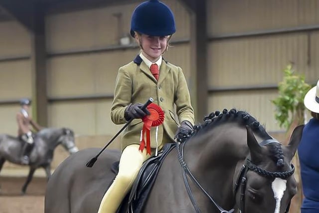 Katie Surgenor and DS Ebony Boy with their red rosette for Class 7. (Pic: Equi-Tog)