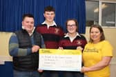 Derg Valley YFC and Seskinore YFC have joined forces to raise an incredible £8,500 for Friends of the Cancer Centre. Pictured are members from Seskinore YFC