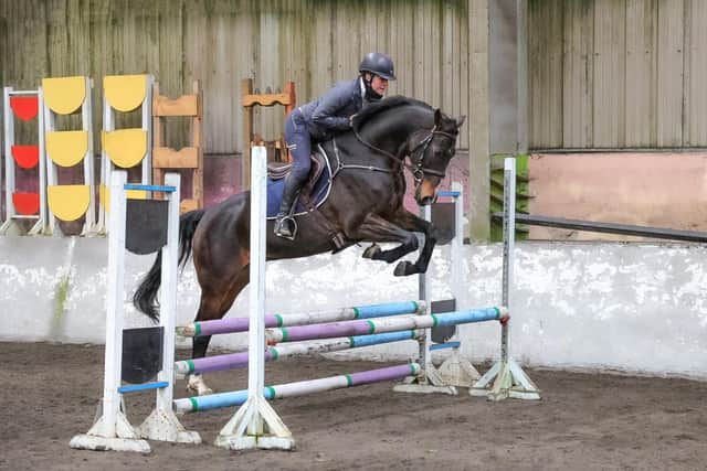 Rosie Alcorn jumping her young horse Babaganoush, their first outing over jumps. (Pic: Lyndon McKee Photography)