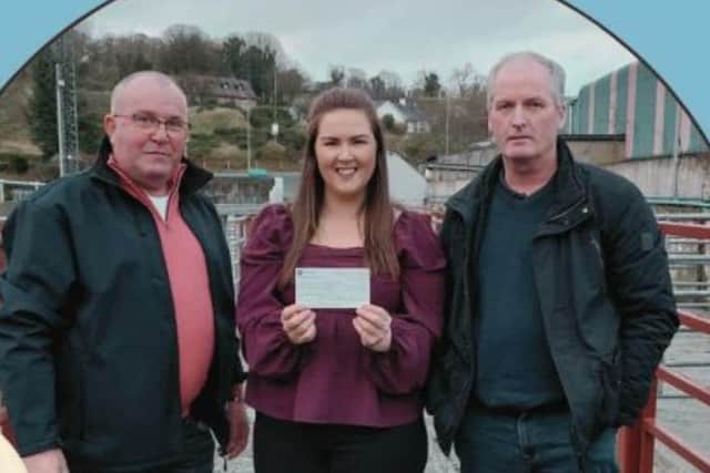 Brian Kerlin and Alan Patterson presenting a cheque to Edel Conway for her Digg 4 Kids Fundraiser