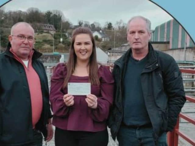 Brian Kerlin and Alan Patterson presenting a cheque to Edel Conway for her Digg 4 Kids Fundraiser
