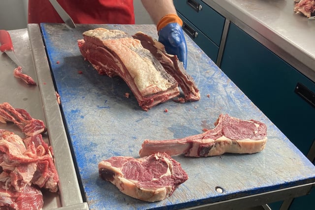 David demonstrates how ribeye and tomahawk steaks are cut from the carcass.