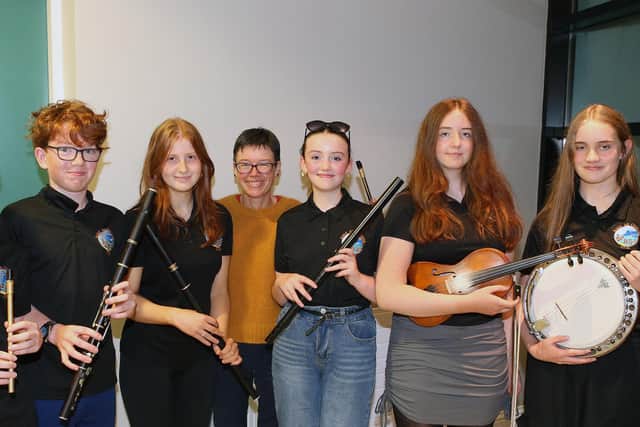 Marie Kinney and the Ballycastle Comhaltas Group who entertained the audience at the launch of The Glynns, Volume 50. Pic: McAuley Multimedia