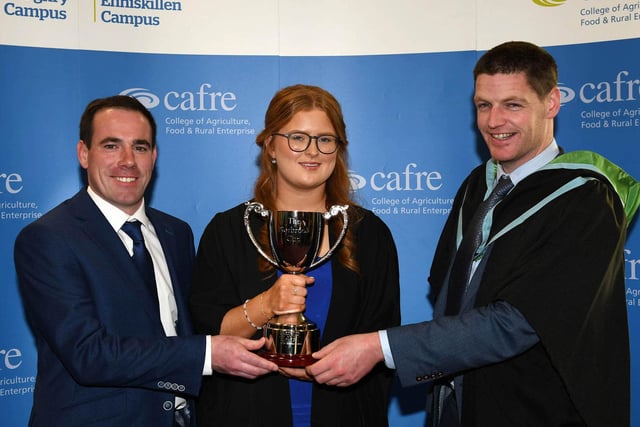 Rebekah Evans (Desertmartin) received the Norbrook Cup for performance in animal health on the Level 3 Advanced Technical Extended Diploma in Agriculture at the Greenmount Graduation Ceremony. Congratulating Rebekah are James Flanagan (Norbrook Laboratories) and John Hamilton (Agriculture Lecturer, CAFRE)
