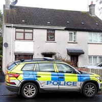 Man rushed to hospital after being shot in leg by four masked men wielding iron bars