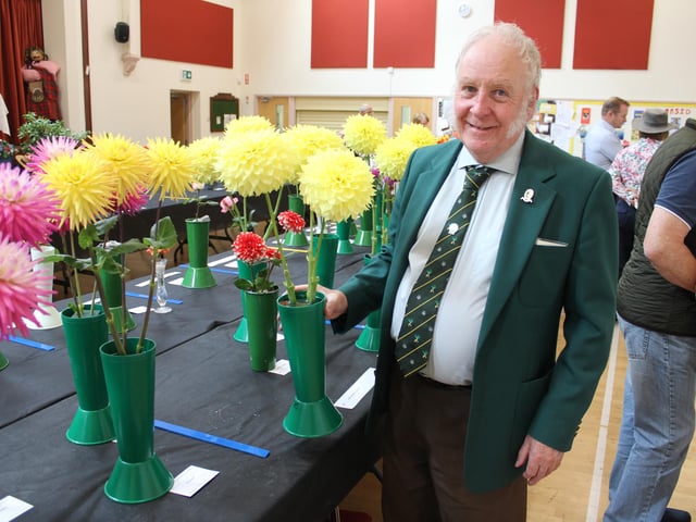 Charlie Holmes with his prize winning Daihlias