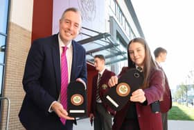 Education Minister Paul Givan with St Ronan's College Key Stage 3 pupil Lucy at the launch of the mobile phone-free pilot.