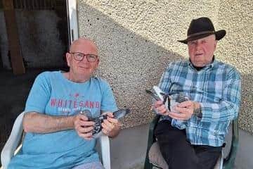 Me and the boss with our winning pigeons yesterday chilling, B & D Coyle of the Coleraine Premier HPS.