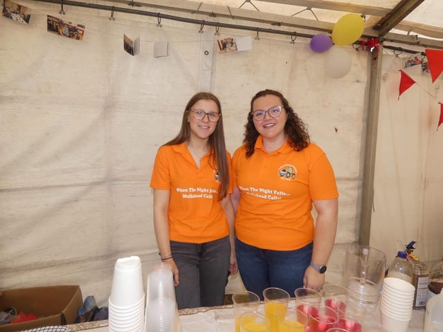 Collone YFC members Grace and Ruth helping at the Collone YFC stand