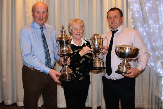 Robert Dick, URBA Chairman and Isabel Dick presenting Mark Smyth with his Blackface Trophies