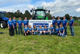 Castlecaulfield YFC stewards pictured with signage at the club's tractor run. Picture: Castlecaulfield YFC