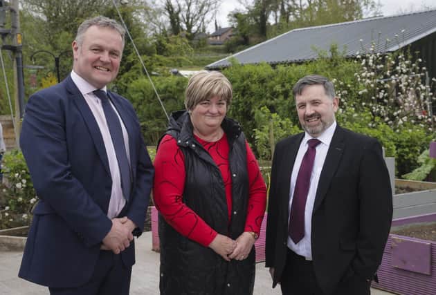 Geraldine Lawless, chair of TADA Rural Support Network, Health minister Robin Swann and Cllr Kyle Savage, vice chair TADA
