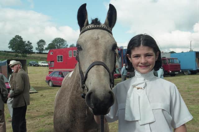 Pictured in September 1995 at the Ahoghill Pony Fair is 13-year-old Corrine Robb of Ballymena with her pony, Peggy Sue. Picture: Farming Life/News Letter archives