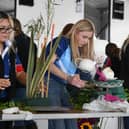 YFCU members participating in the YFCU floral art competition at the 2023 Balmoral Show. Picture: YFCU
