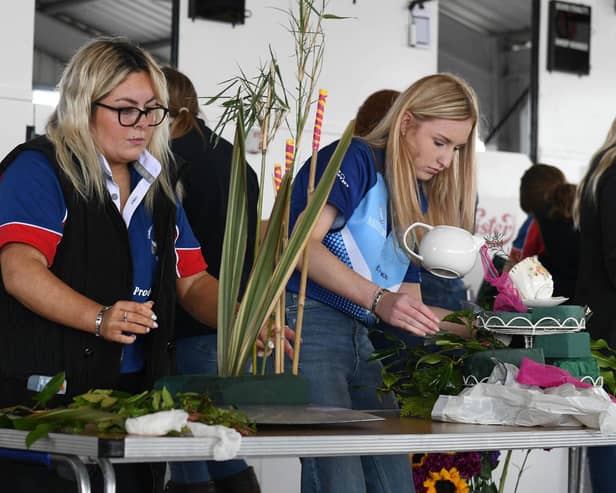 YFCU members participating in the YFCU floral art competition at the 2023 Balmoral Show. Picture: YFCU