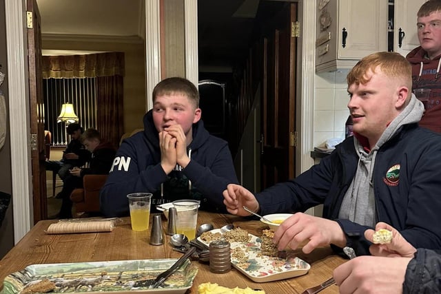 Lisnamurrican YFC members John Hamilton and Jamie Witherspoon enjoying the club's roving supper which was held recently. Picture: Lisnamurrican YFC